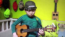 Kid Playing Ukulele